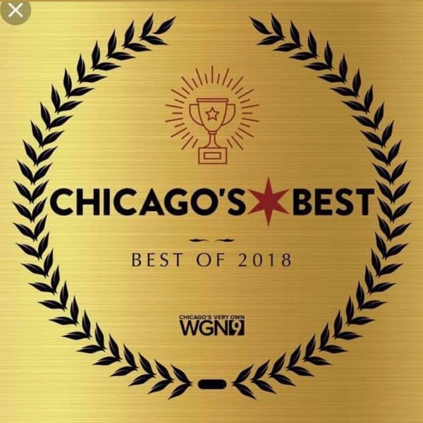 Gold award plaque for "Chicago's Best, Best of 2018" from WGN9, with a trophy and laurel wreath.