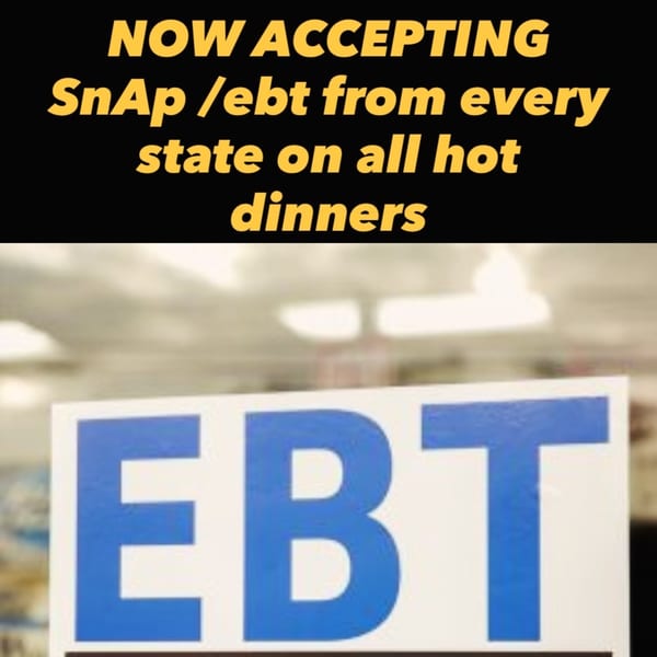 A sign announces Chef Daddy's accepts SNAP/EBT from every state for hot dinners.